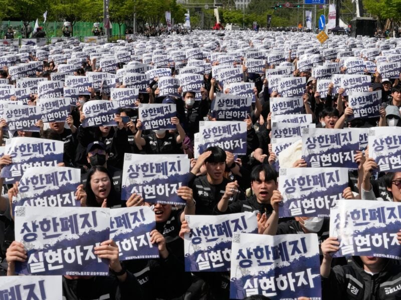 Image for article: Samsung workers rally in South Korea, demanding higher pay and threatening to strike