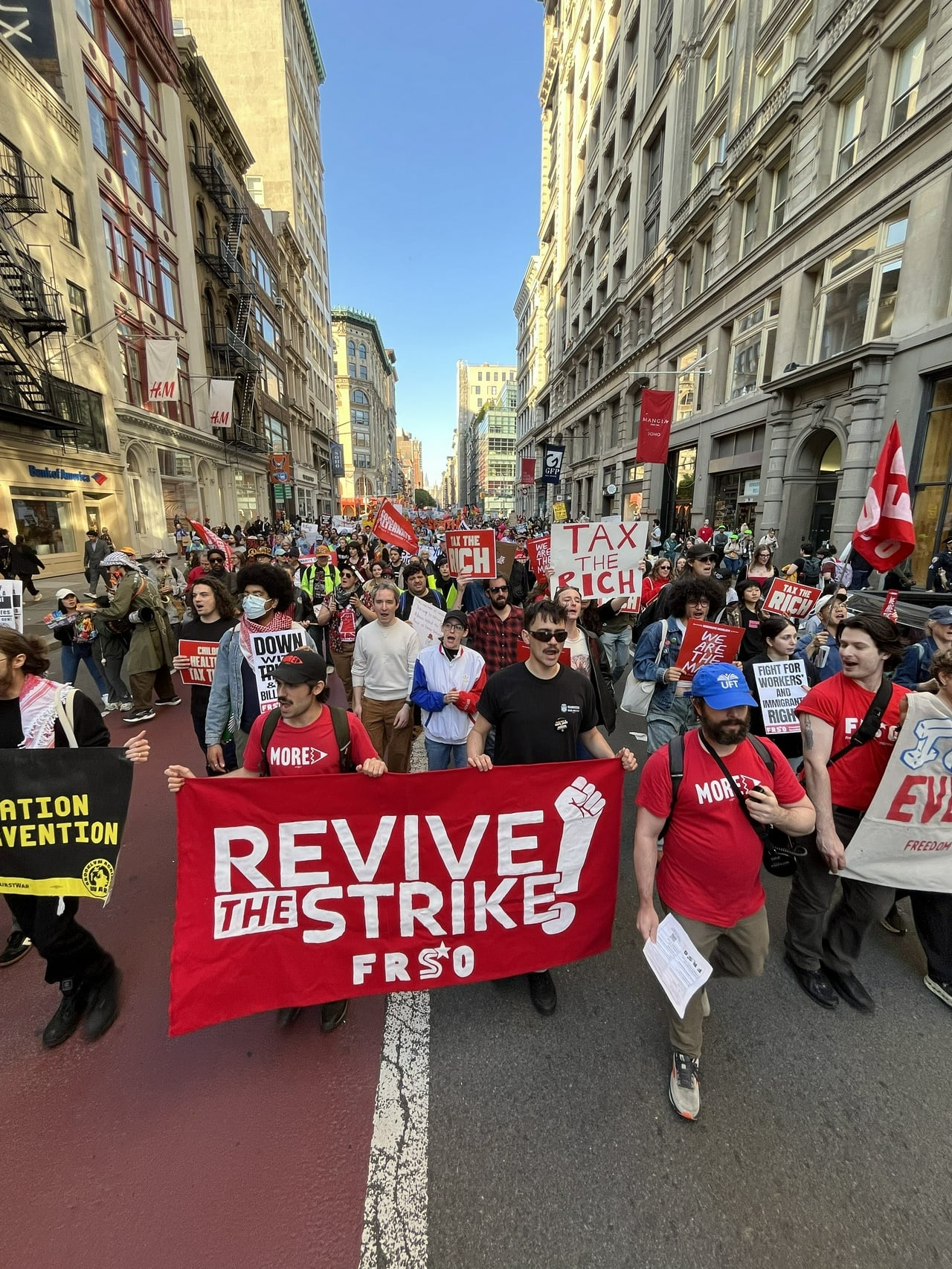Image for article: Thousands take to the streets of Manhattan to celebrate International Workers’ Day