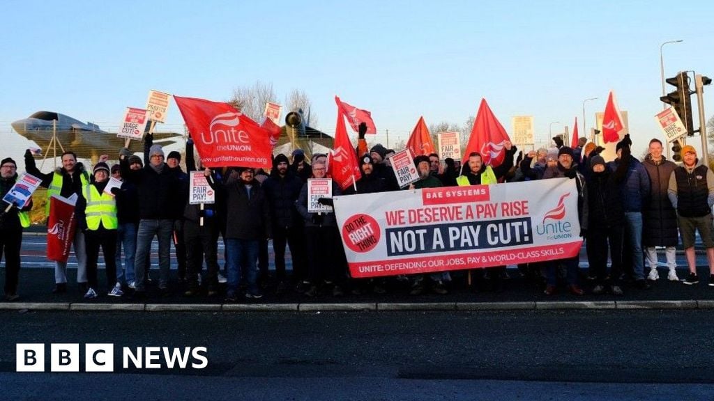 Image for article: Defence giant BAE hails record sales as <b>workers</b> remain on <b>strike</b> - BBC