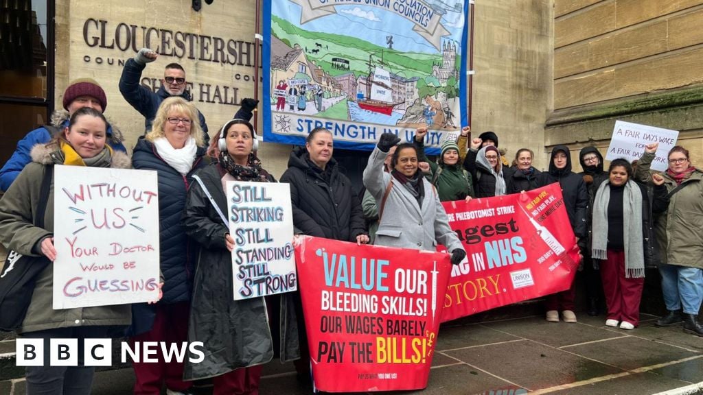 Image for article: Staff staging longest strike in NHS history are to get one-off payment