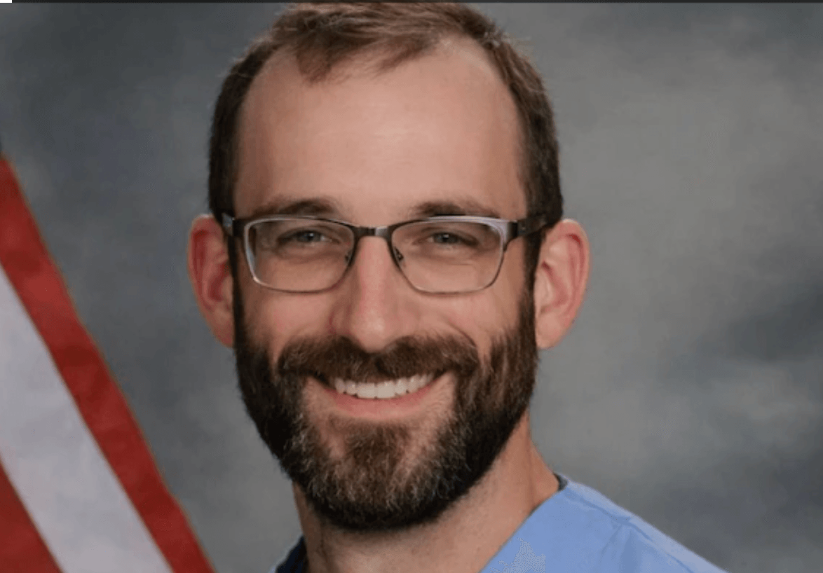 Image for article: Alex Pretti's Next-Door Neighbor Talks Grief, Community Meetings, &amp; Organizing Target <b>Workers</b>