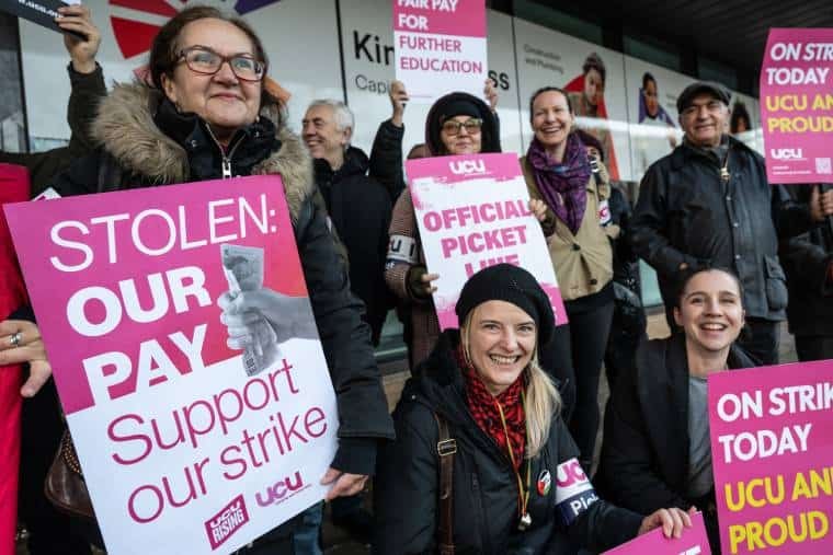 Image for article: College workers stage strong rally on third day of strikes