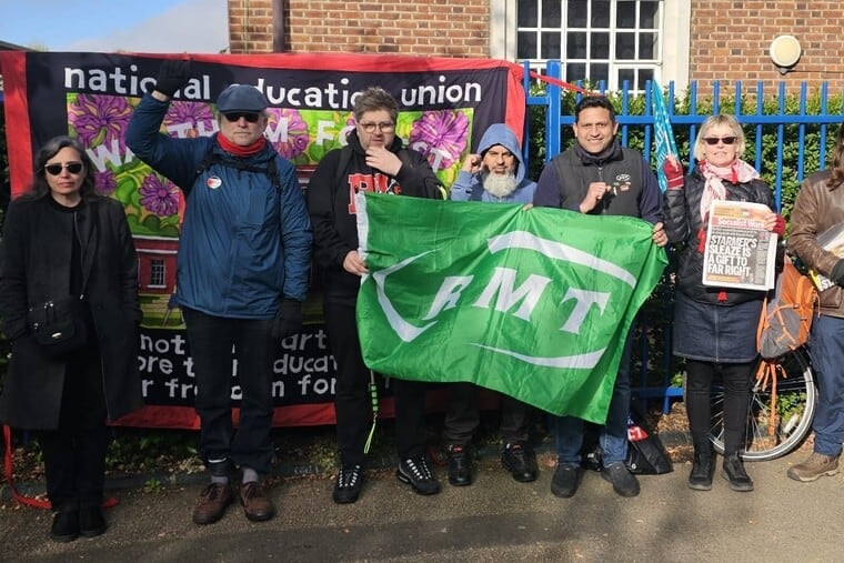 Image for article: Strikers battle bosses and scabs at east London school
