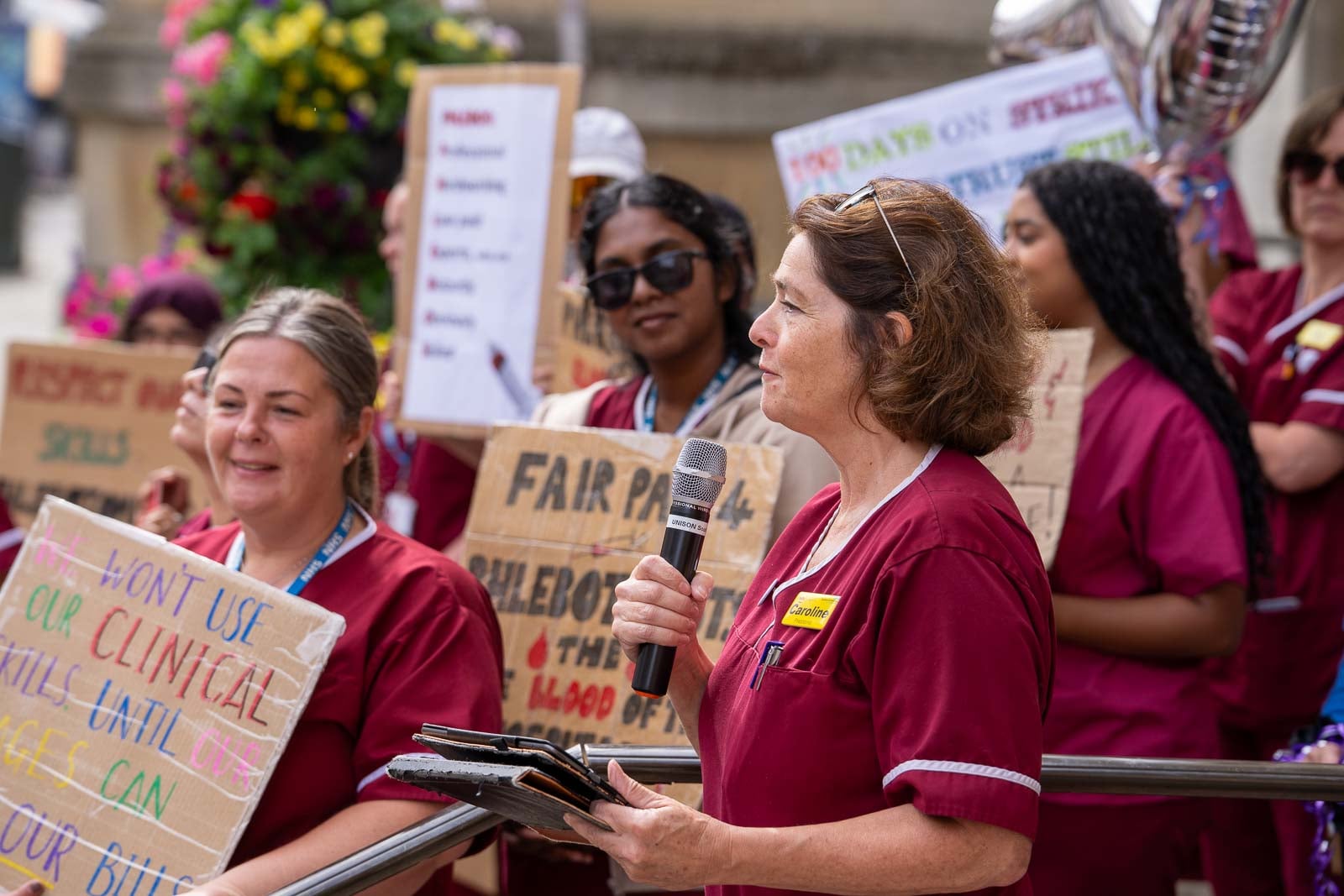 Phlebotomists mark longest-running <b>strike</b> of NHS <b>workers</b> in history with Gloucester rally