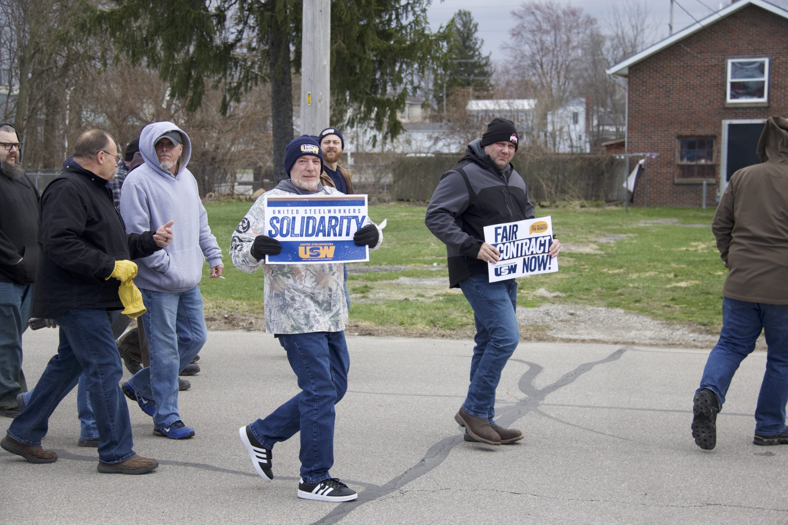 Image for article: Union workers march as ArcelorMittal strike hits day 59