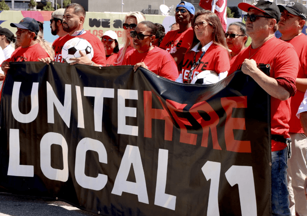 Image for article: Just Days Before The Start Of The World Cup/FIFA Soccer Matches In The U.S., UNITE HERE-Represented SoFi Stadium Workers In Los Angeles ‘Win A Historic Contract’ That Also ‘Reserves The Right To Strike If ICE Threatens Safety’