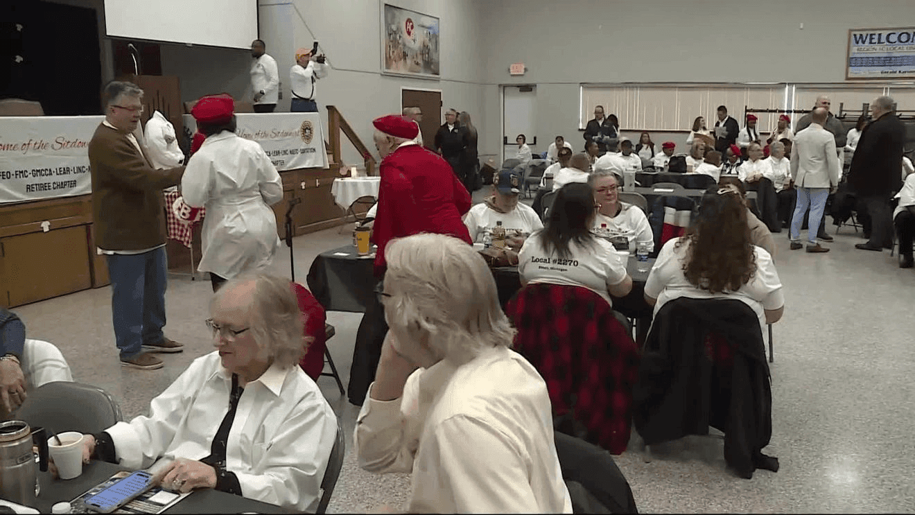 Image for article: UAW members wear white shirts to mark anniversary of 1937 Flint strike win